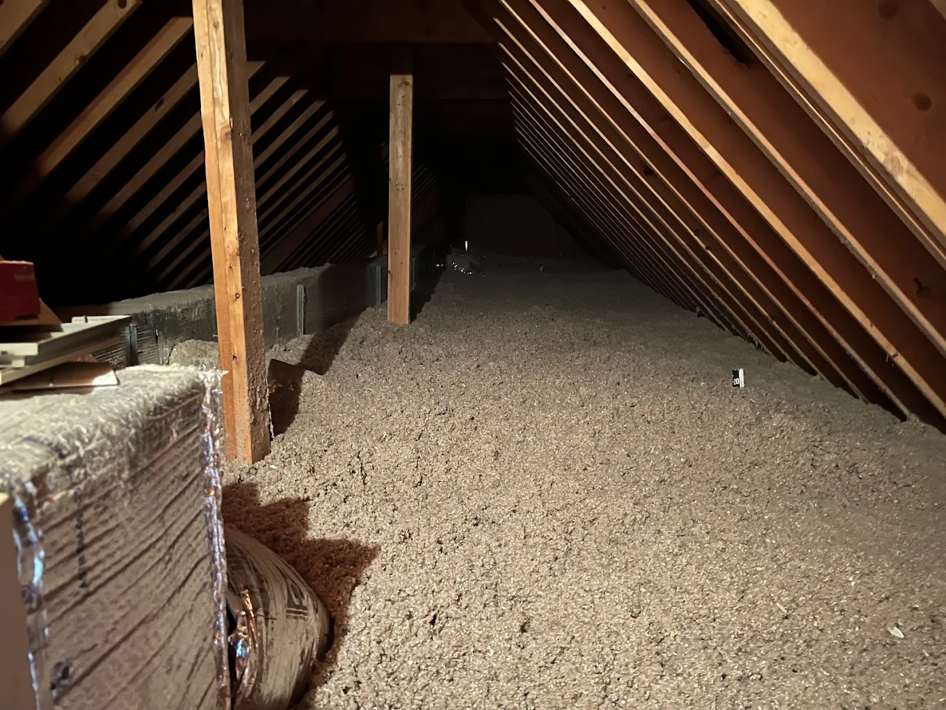 2024-08-23 Dark attic with insulation